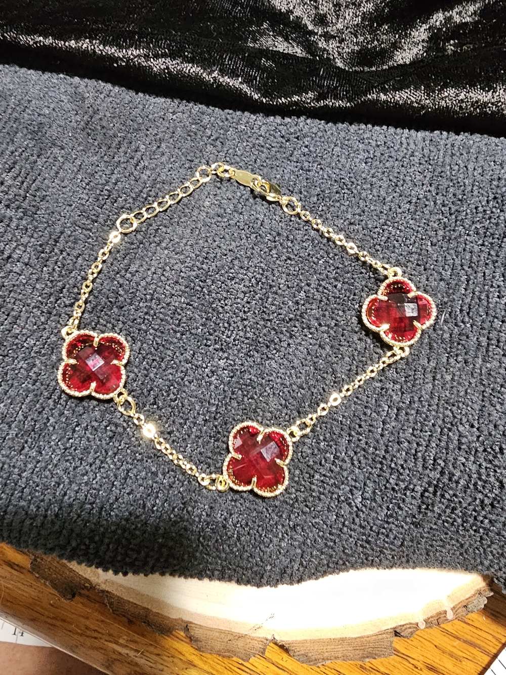 Gold Bracelet with Red Clover Gem Accents